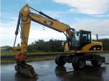Kolesové rýpadlo CAT M318D