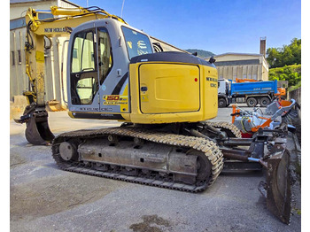 Pásové rýpadlo NEW HOLLAND