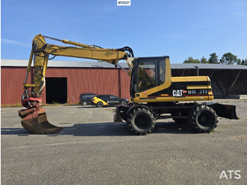 Kolesové rýpadlo CATERPILLAR M315