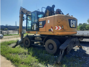 Kolesové rýpadlo CATERPILLAR MH3024