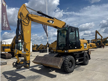 Kolesové rýpadlo CATERPILLAR M313D
