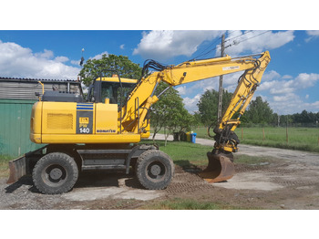 Kolesové rýpadlo KOMATSU PW140