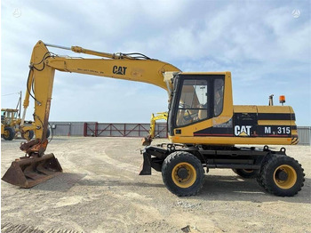 Kolesové rýpadlo CATERPILLAR M315