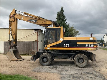 Kolesové rýpadlo CATERPILLAR M320