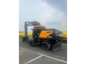 Kolesové rýpadlo HYUNDAI R210