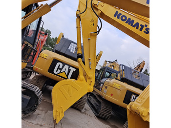 Pásové rýpadlo KOMATSU PC210