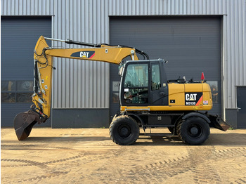 Kolesové rýpadlo CATERPILLAR M313D