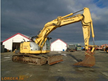 Pásové rýpadlo NEW HOLLAND