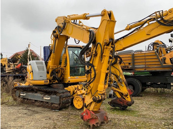 Pásové rýpadlo NEW HOLLAND