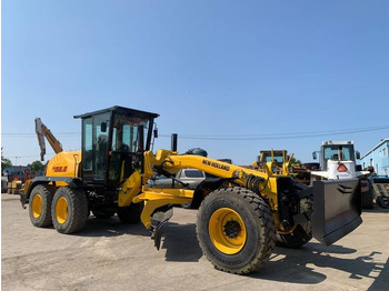 Zrovnávač NEW HOLLAND