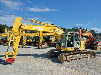 Pásové rýpadlo NEW HOLLAND