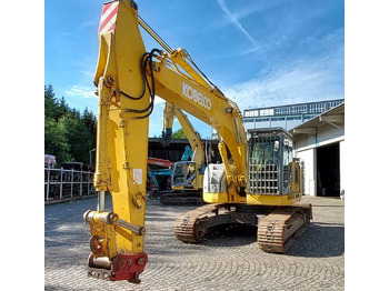 Pásové rýpadlo NEW HOLLAND