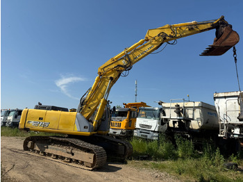 Pásové rýpadlo NEW HOLLAND