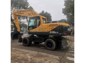 Kolesové rýpadlo HYUNDAI R210