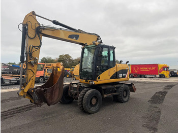 Kolesové rýpadlo CATERPILLAR M313D