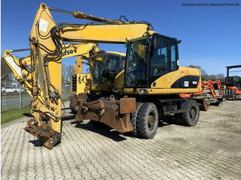 Kolesové rýpadlo CATERPILLAR M315D