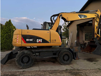 Kolesové rýpadlo CATERPILLAR M316D