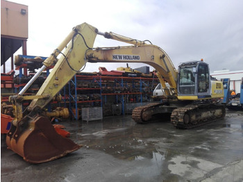 Pásové rýpadlo NEW HOLLAND