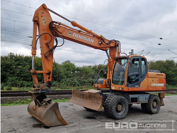 Kolesové rýpadlo DOOSAN DX210