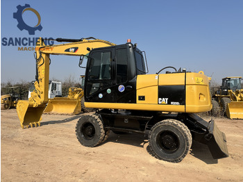 Kolesové rýpadlo CATERPILLAR M320
