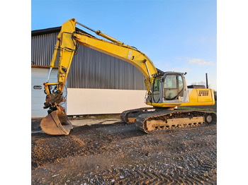 Pásové rýpadlo NEW HOLLAND