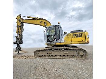 Pásové rýpadlo NEW HOLLAND