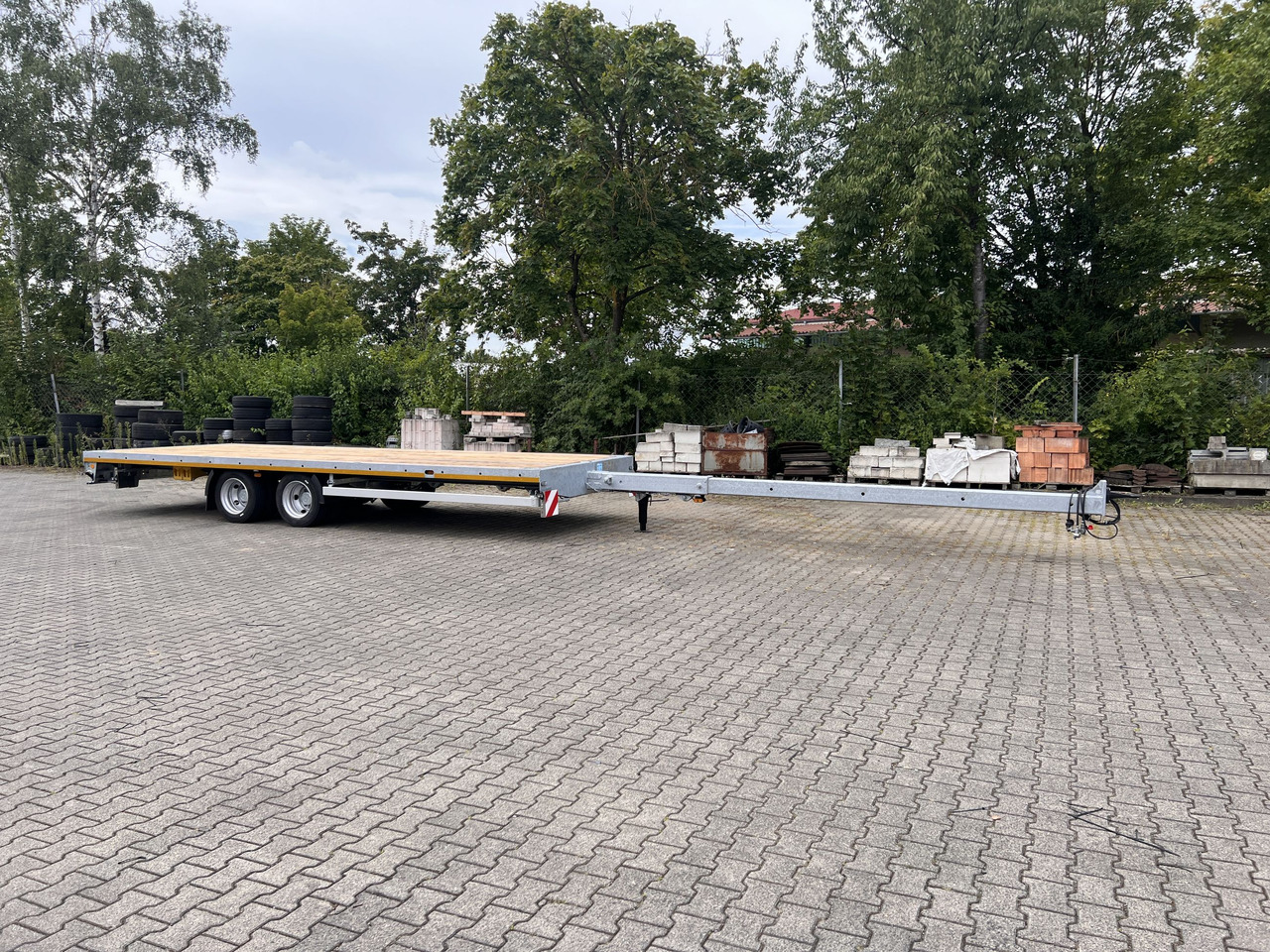 Möslein THT 14-G 7,20 L ausziehbar 13,9 t Tandemanhänger- Tieflader, ausziehbarLuftgefedert - Plošinový/ Valníkový príves: obrázok 1 Möslein THT 14-G 7,20 L ausziehbar 13,9 t Tandemanhänger- Tieflader, ausziehbarLuftgefedert - Plošinový/ Valníkový príves: obrázok 1