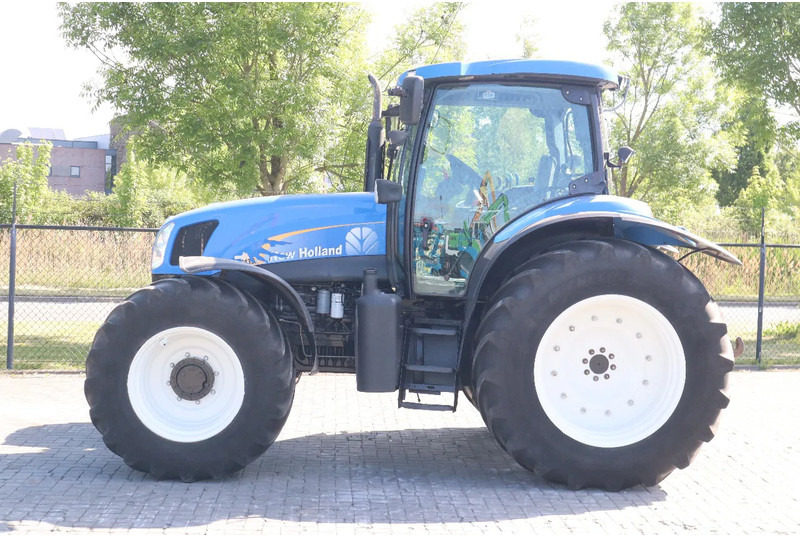 New Holland TS135A | 40 KM/H | 4X4 | SUPERSTEER - Traktor: obrázok 1 New Holland TS135A | 40 KM/H | 4X4 | SUPERSTEER - Traktor: obrázok 1