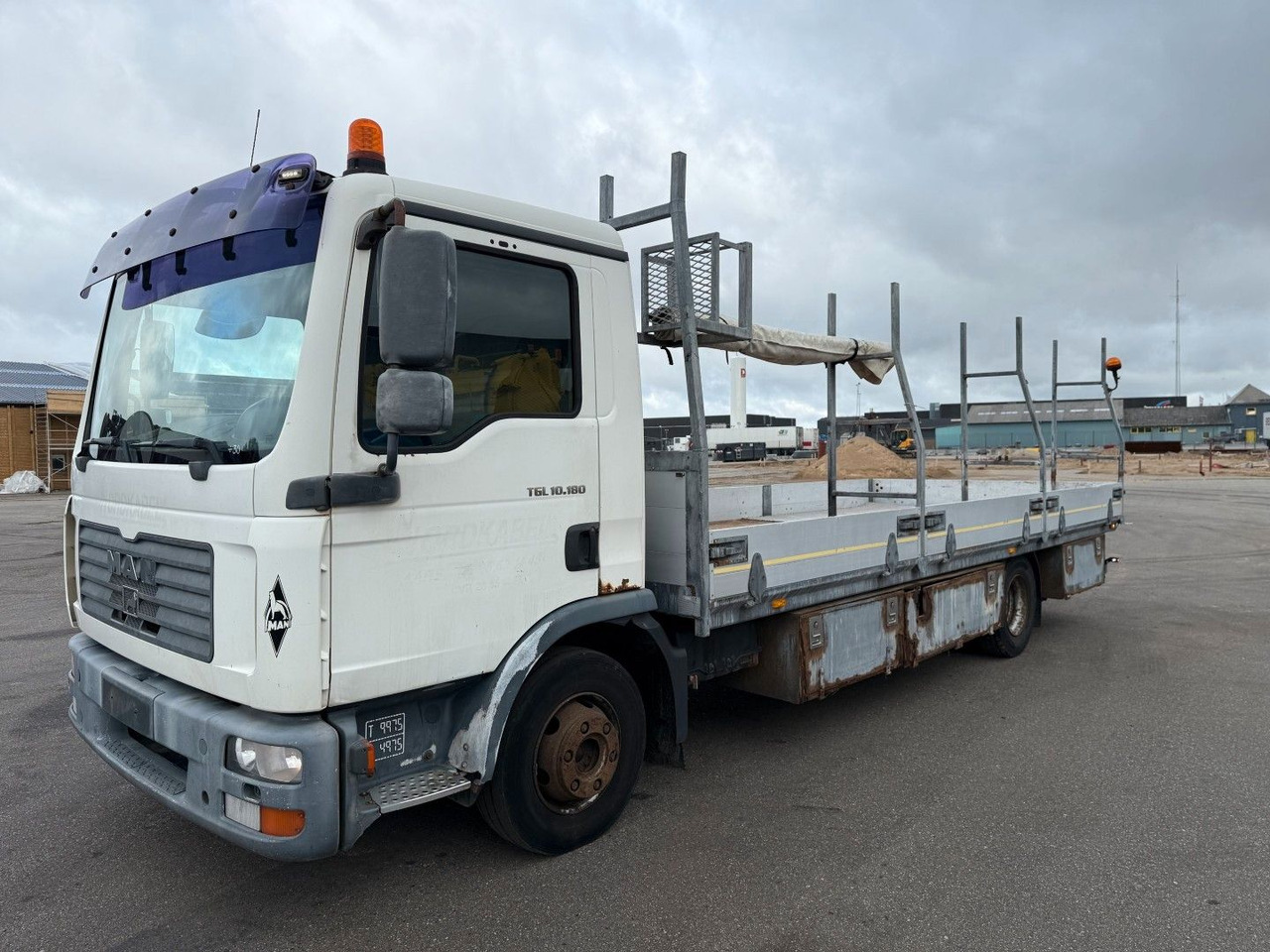 MAN TGL 10.180 4x2 Flatbed 6,,80 m. Euro 3 - Valníkový/ Plošinový nákladný automobil: obrázok 1 MAN TGL 10.180 4x2 Flatbed 6,,80 m. Euro 3 - Valníkový/ Plošinový nákladný automobil: obrázok 1