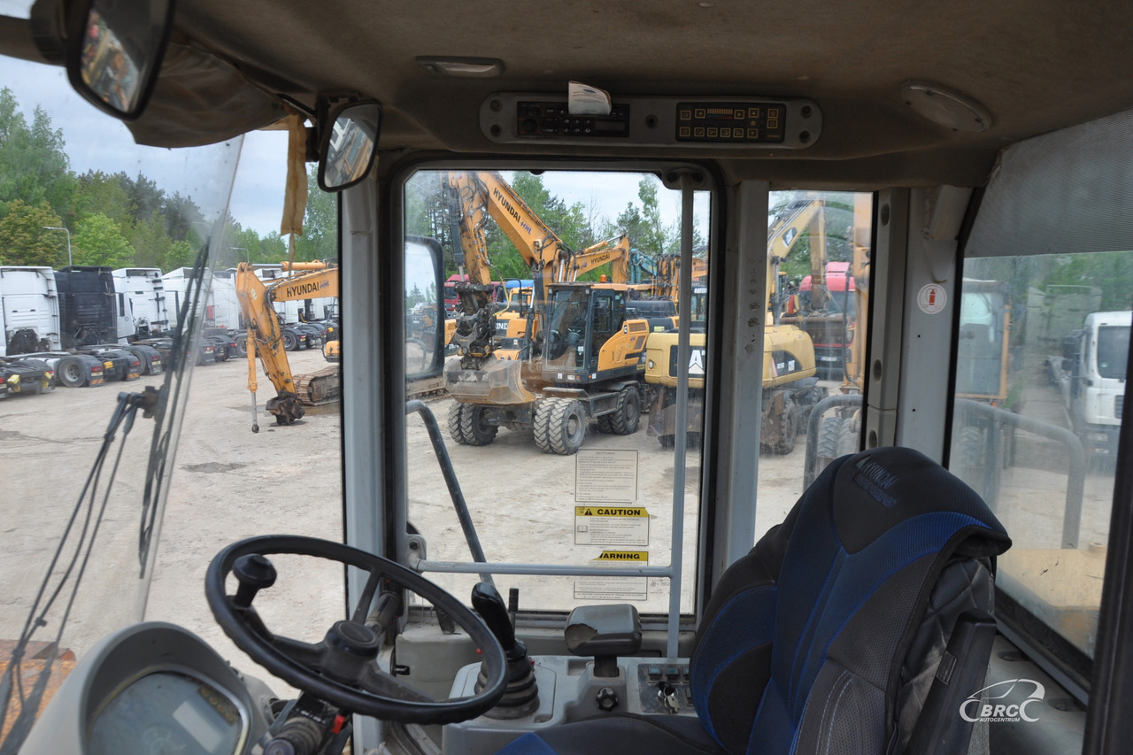 Kolesový nakladač Hyundai HL770-7: obrázok 10