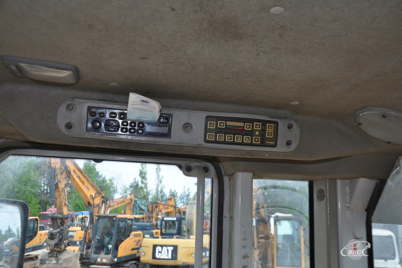 Kolesový nakladač Hyundai HL770-7: obrázok 11