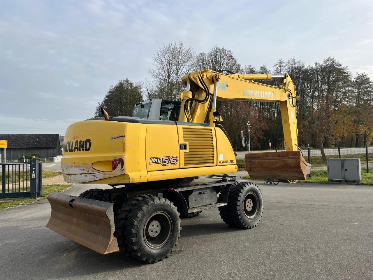 New Holland MH 5.6 inkl. Grabenlöffel, Tieflöffel - Kolesové rýpadlo: obrázok 5 New Holland MH 5.6 inkl. Grabenlöffel, Tieflöffel - Kolesové rýpadlo: obrázok 5