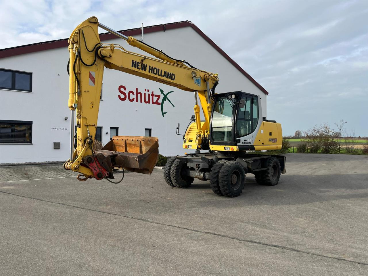 New Holland MH 5.6 inkl. Grabenlöffel, Tieflöffel - Kolesové rýpadlo: obrázok 1 New Holland MH 5.6 inkl. Grabenlöffel, Tieflöffel - Kolesové rýpadlo: obrázok 1