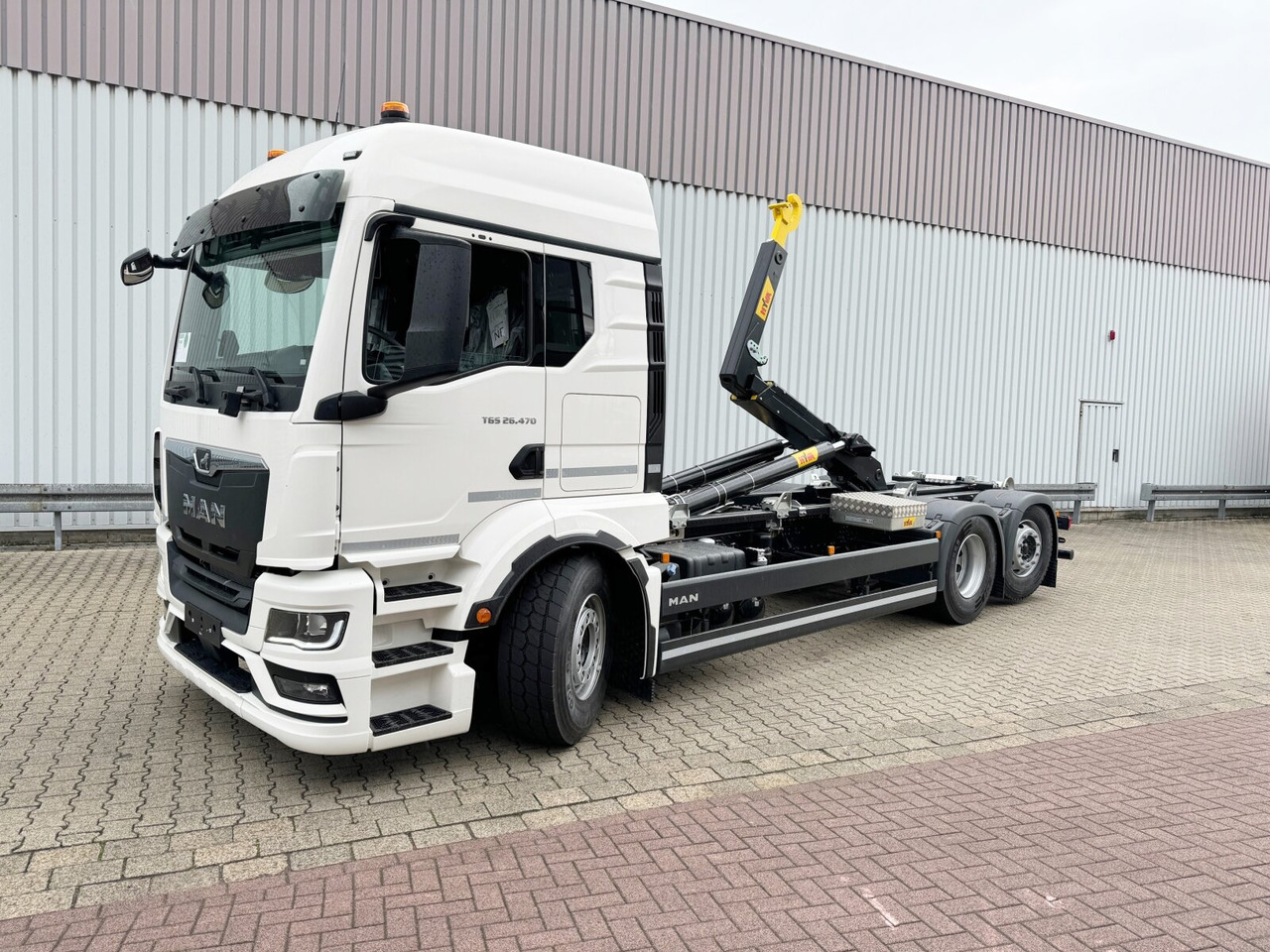 MAN TGS 26.470 6x2-4 LL CH TGS 26.470 6x2-4 LL CH, Retarder, Navi, Lenk-/Liftachse - Hákový nosič kontajnerov: obrázok 1 MAN TGS 26.470 6x2-4 LL CH TGS 26.470 6x2-4 LL CH, Retarder, Navi, Lenk-/Liftachse - Hákový nosič kontajnerov: obrázok 1
