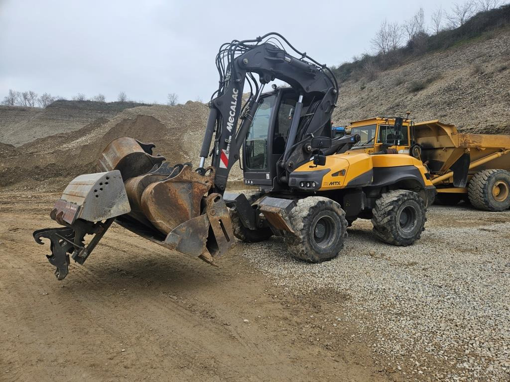 MECALAC 12 MTX - Kolesové rýpadlo: obrázok 1 MECALAC 12 MTX - Kolesové rýpadlo: obrázok 1