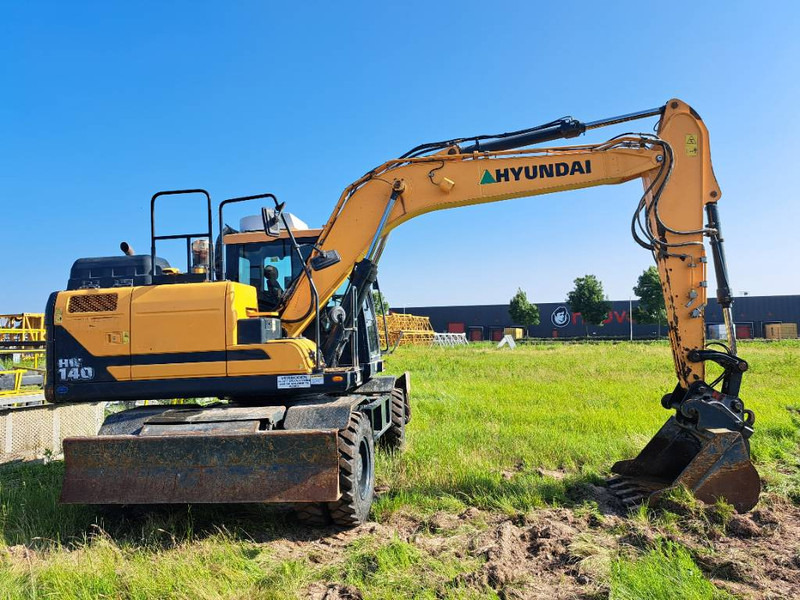 Hyundai HW140 - Kolesové rýpadlo: obrázok 4 Hyundai HW140 - Kolesové rýpadlo: obrázok 4