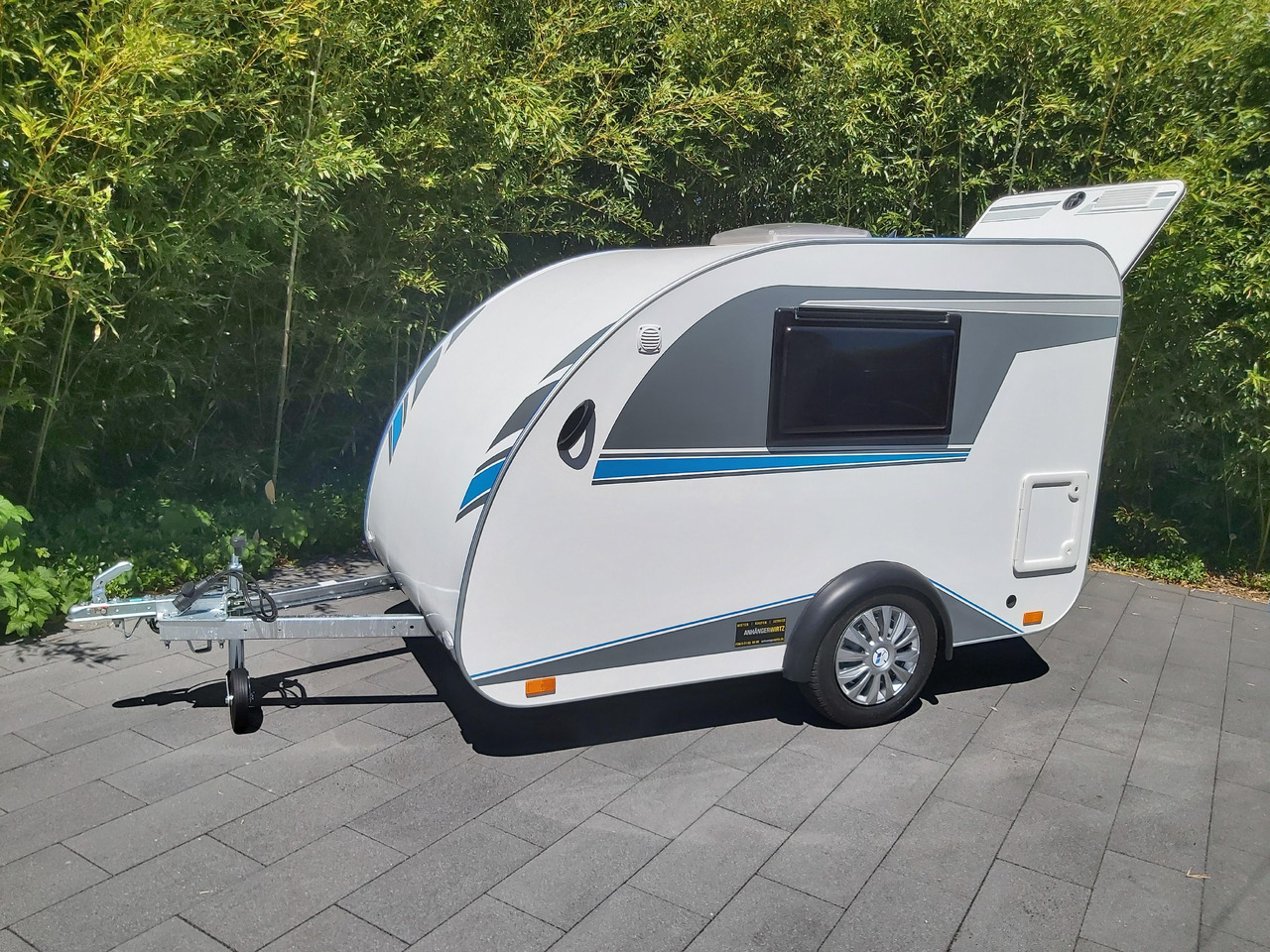Mini Camper Mini Tommy TMC25 Basic V1 252x140x121cm Küche 100km/H 750kg ohne Bremse Winter Aktion - Obytný príves: obrázok 2 Mini Camper Mini Tommy TMC25 Basic V1 252x140x121cm Küche 100km/H 750kg ohne Bremse Winter Aktion - Obytný príves: obrázok 2