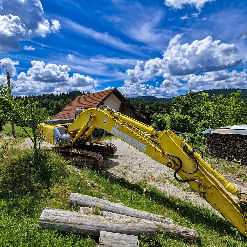 New Holland Kobelco E215 - Pásové rýpadlo: obrázok 3 New Holland Kobelco E215 - Pásové rýpadlo: obrázok 3