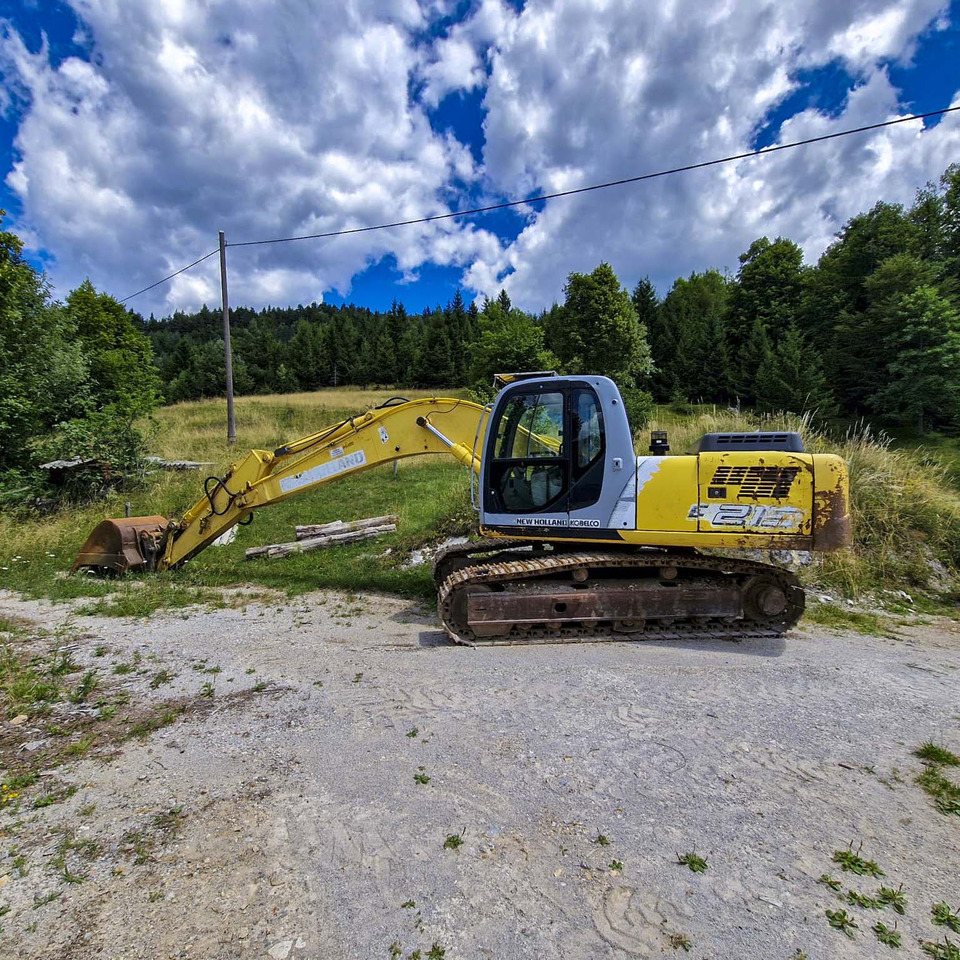 New Holland Kobelco E215 - Pásové rýpadlo: obrázok 1 New Holland Kobelco E215 - Pásové rýpadlo: obrázok 1