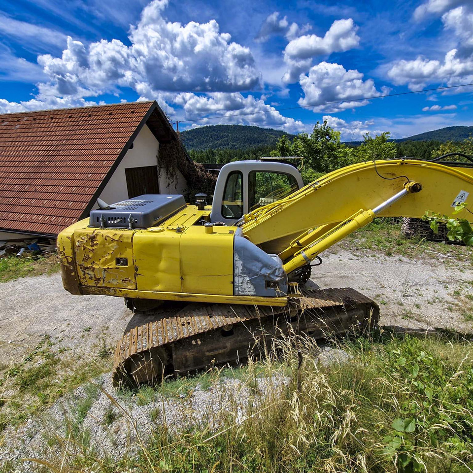 New Holland Kobelco E215 - Pásové rýpadlo: obrázok 4 New Holland Kobelco E215 - Pásové rýpadlo: obrázok 4