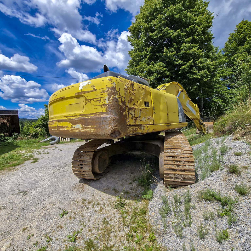 New Holland Kobelco E215 - Pásové rýpadlo: obrázok 5 New Holland Kobelco E215 - Pásové rýpadlo: obrázok 5