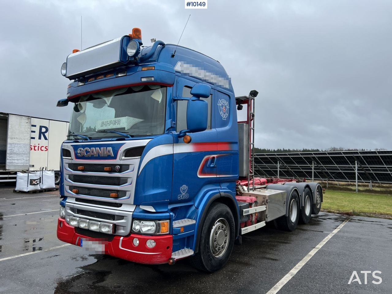 Scania R560 Tridem Hooklift Truck - Hákový nosič kontajnerov: obrázok 1 Scania R560 Tridem Hooklift Truck - Hákový nosič kontajnerov: obrázok 1