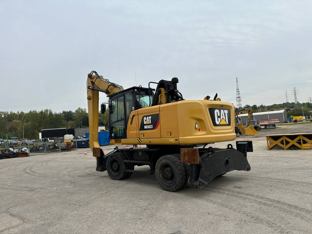 CAT MH3022 - Kolesové rýpadlo: obrázok 4 CAT MH3022 - Kolesové rýpadlo: obrázok 4