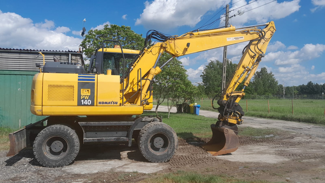 KOMATSU PW 140-7 - Kolesové rýpadlo: obrázok 1 KOMATSU PW 140-7 - Kolesové rýpadlo: obrázok 1
