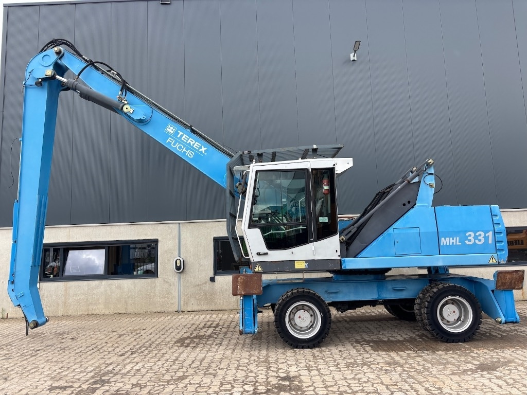 Fuchs MHL 331 D - MHL 335 - MHL 340 - Překládkové rýpadlo: obrázok 4 Fuchs MHL 331 D - MHL 335 - MHL 340 - Překládkové rýpadlo: obrázok 4