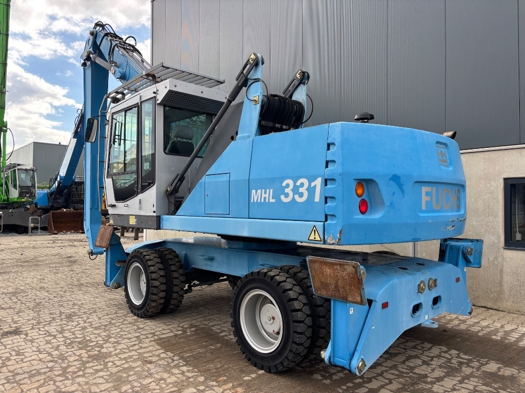 Fuchs MHL 331 D - MHL 335 - MHL 340 - Překládkové rýpadlo: obrázok 5 Fuchs MHL 331 D - MHL 335 - MHL 340 - Překládkové rýpadlo: obrázok 5
