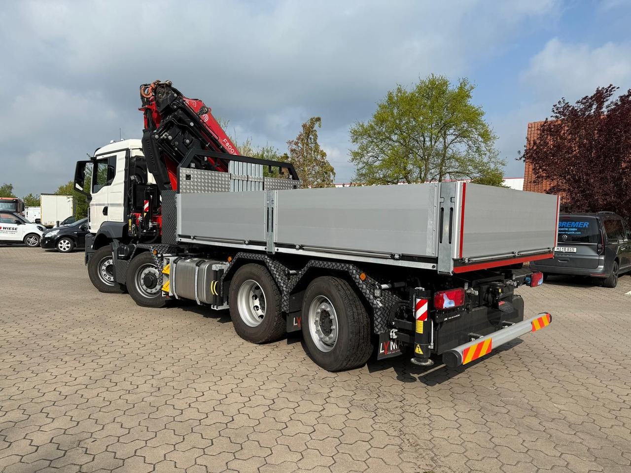 MAN 35.520 8x4 mit Kran Fassi F800 RA2.28 - Valníkový/ Plošinový nákladný automobil, Auto s hydraulickou rukou: obrázok 1 MAN 35.520 8x4 mit Kran Fassi F800 RA2.28 - Valníkový/ Plošinový nákladný automobil, Auto s hydraulickou rukou: obrázok 1