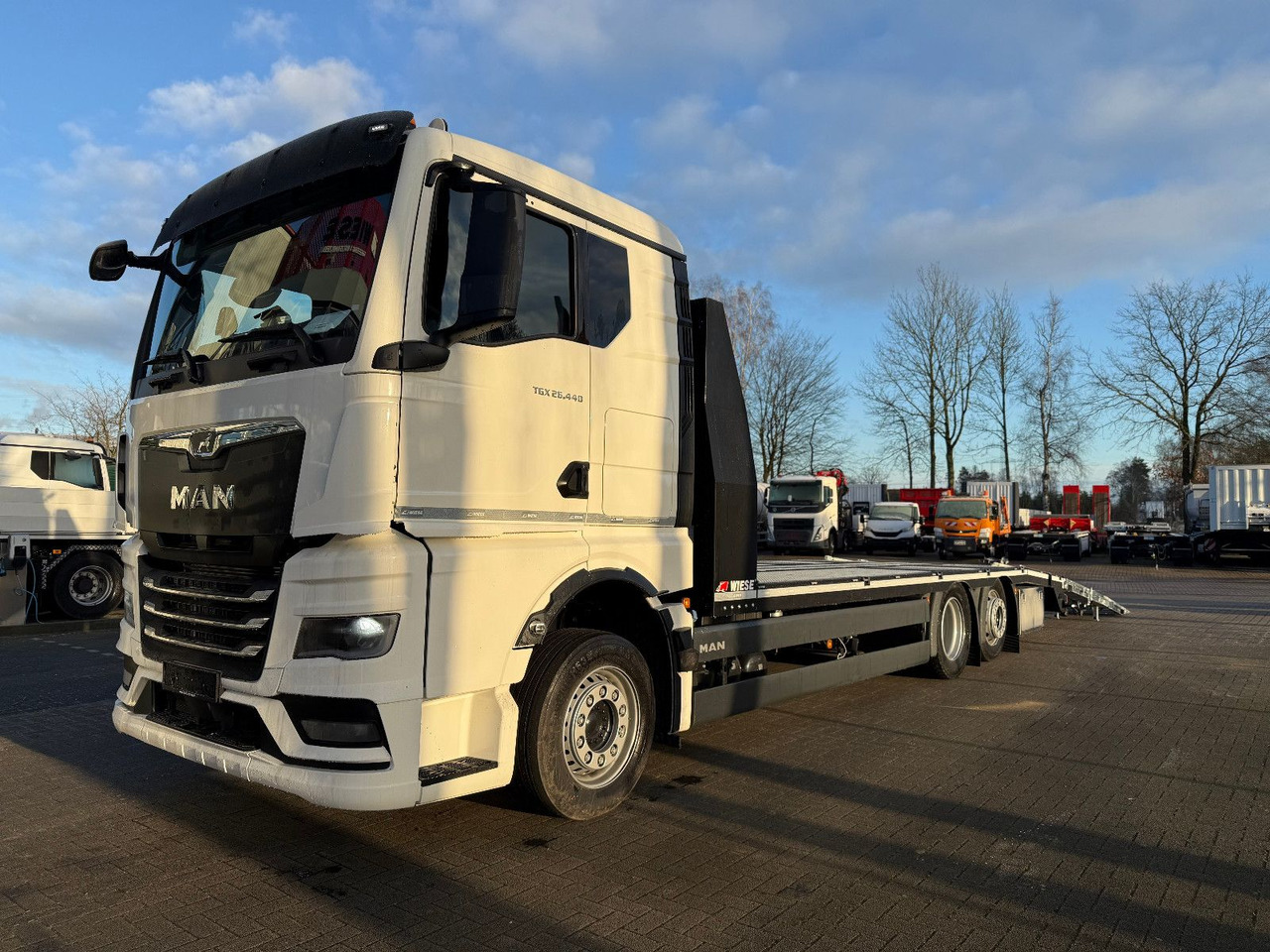 MAN Baumaschinen- Arbeitsbühnentransporter Rampen - Valníkový/ Plošinový nákladný automobil: obrázok 5 MAN Baumaschinen- Arbeitsbühnentransporter Rampen - Valníkový/ Plošinový nákladný automobil: obrázok 5