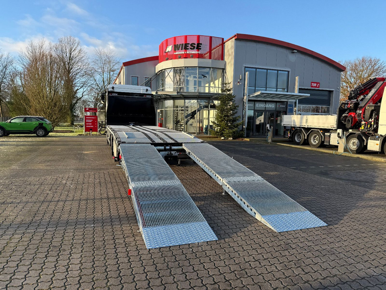 MAN Baumaschinen- Arbeitsbühnentransporter Rampen - Nákladné vozidlo na prepravu automobilov: obrázok 4 MAN Baumaschinen- Arbeitsbühnentransporter Rampen - Nákladné vozidlo na prepravu automobilov: obrázok 4