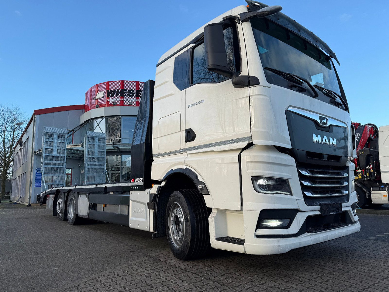 MAN Baumaschinen- Arbeitsbühnentransporter Rampen - Valníkový/ Plošinový nákladný automobil: obrázok 2 MAN Baumaschinen- Arbeitsbühnentransporter Rampen - Valníkový/ Plošinový nákladný automobil: obrázok 2